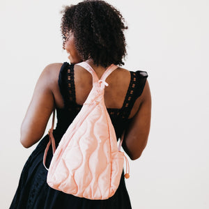 The Versatile Puffer Bag Sling Backpack